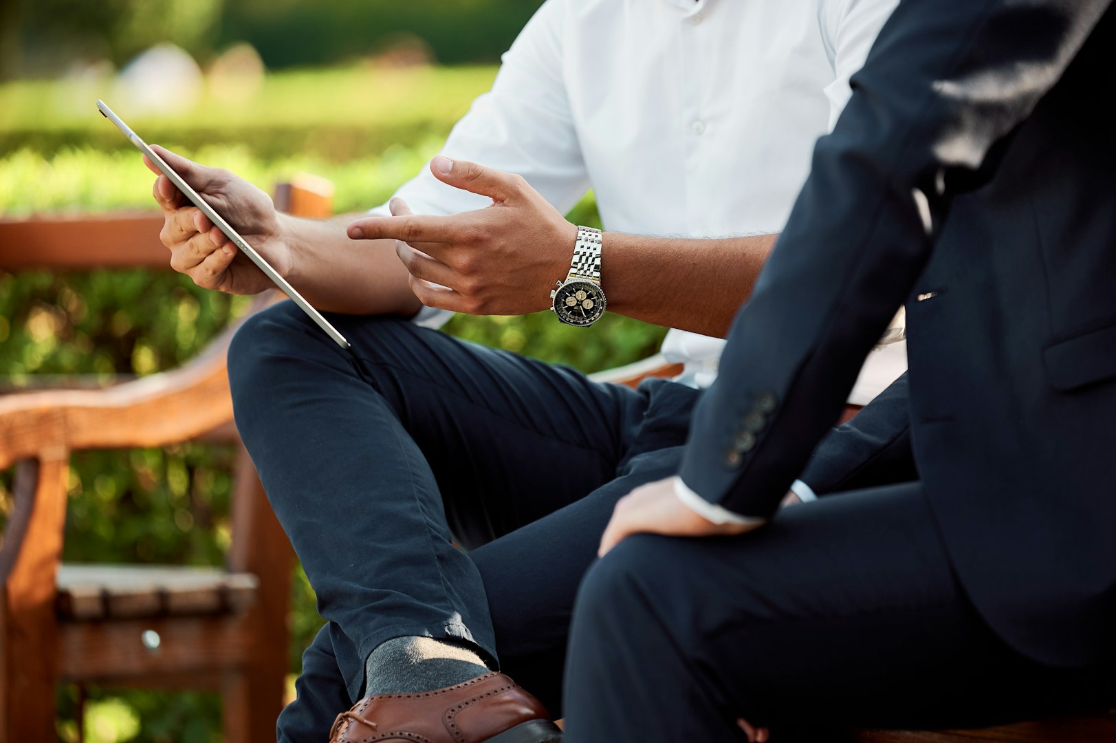 Business, documents and people with meeting discussion for finance trends, policy decision or update. Financial managers, report and feedback in office for investment strategy or risk management team